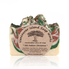 Load image into Gallery viewer, Christmas in a nutshell. The sweet and spicy warmth of this bar will have you feeling festive in no time. Handmade, natural, vegan, olive oil soap. Made on Vancouver Island in BC, Canada.