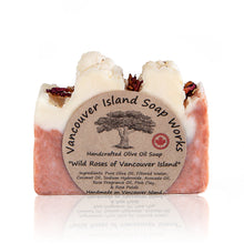 Load image into Gallery viewer, A customer favourite! If you stop and smell the roses then you'll know that there's little better than the scent of wild rose. Combined with the creamy lather of our olive oil soap base and with added french pink clay. Handmade, natural, vegan, olive oil soap. Made on Vancouver Island in BC, Canada.