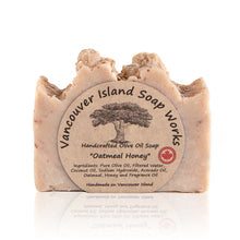 Load image into Gallery viewer, This rich, fragrant soap will soothe your skin with calming organic oatmeal. Combined with pure honey to moisturize and give you a beautiful glow. Handmade, natural, olive oil soap. Made on Vancouver Island in BC, Canada.
